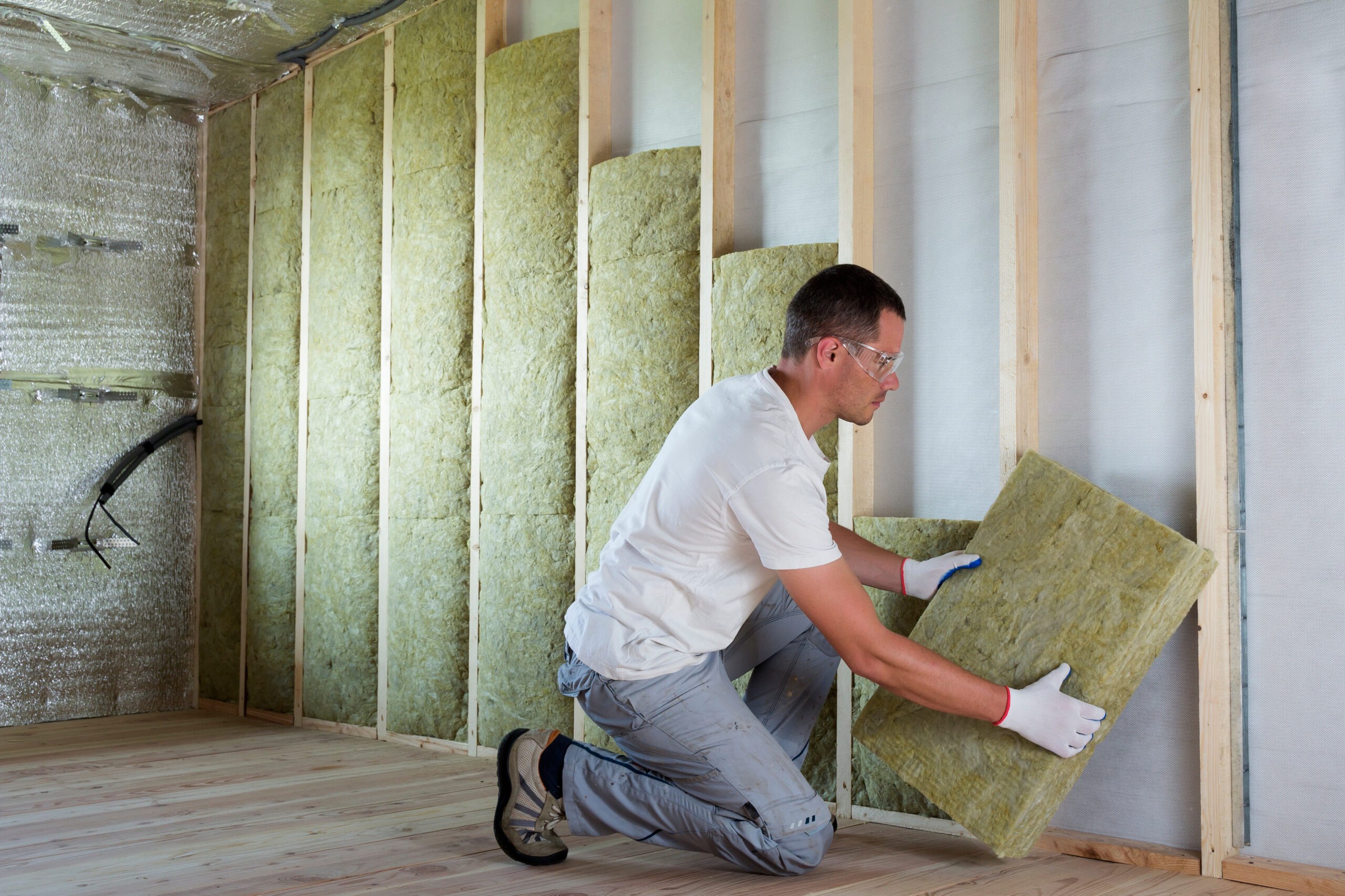 Insulation being fitted as part of a home energy upgrade